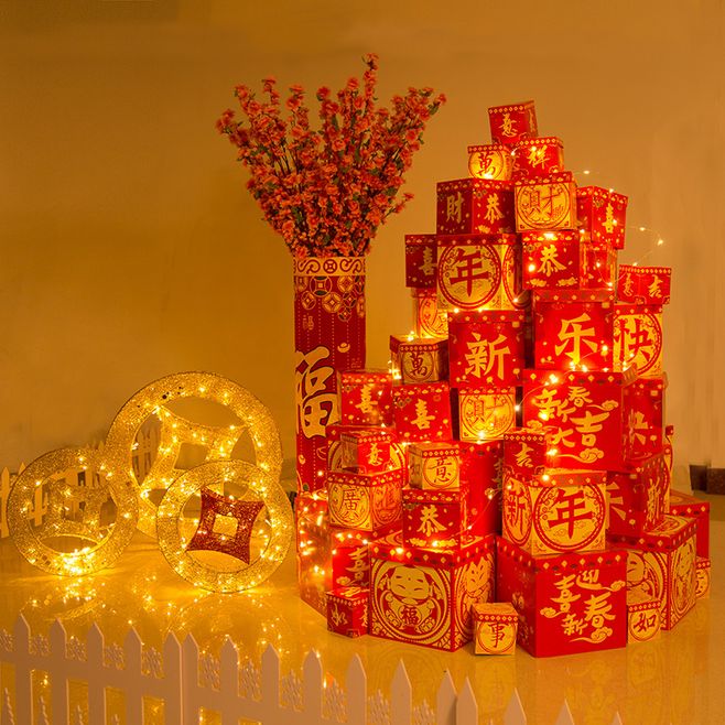 春節(jié)新年裝飾品商場(chǎng)場(chǎng)景布置擺件鞭炮桃花樹坐炮金元寶禮盒堆頭-tmall.com天貓